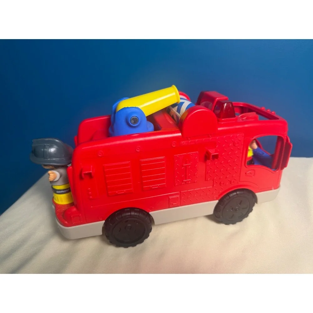 Fisher-Price Little People Lift n Lower Fire Truck Red Toy Vehicle with Figures